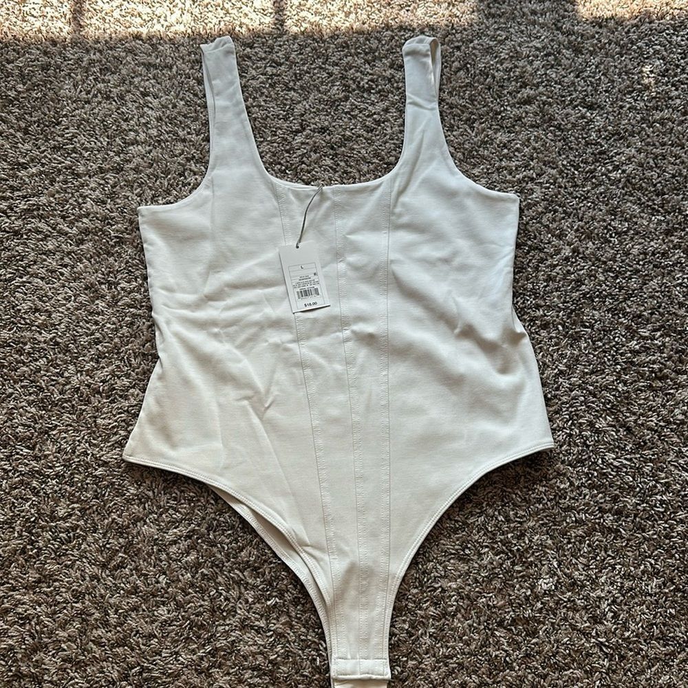 a new day White Bodysuit